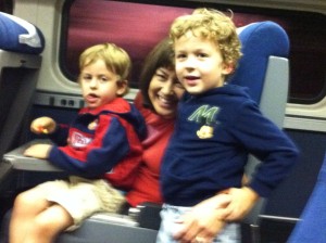 naomi with boys on train